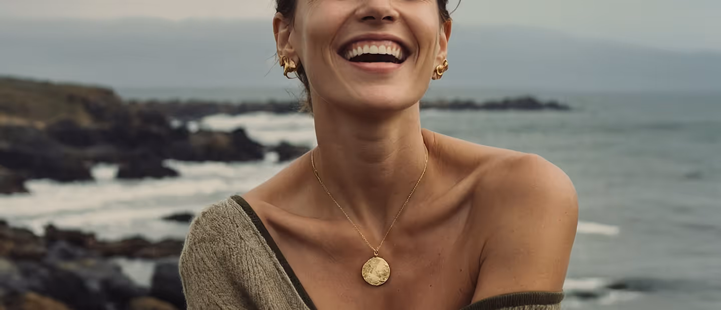 Half Headshot Woman Smiling at the Beach
